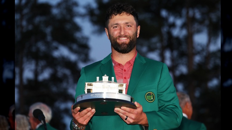 Jon Rahm holding the Masters trophy