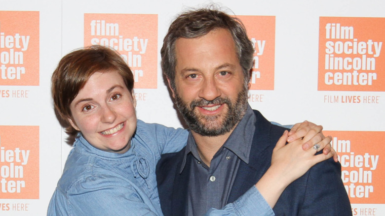 Lena Dunham embracing Judd Apatow