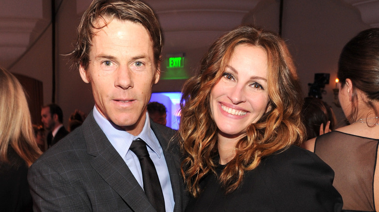 Danny Moder smiling with Julia Roberts