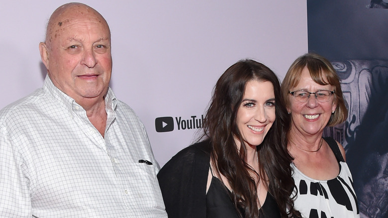 Justin Bieber's mother and grandparents smile