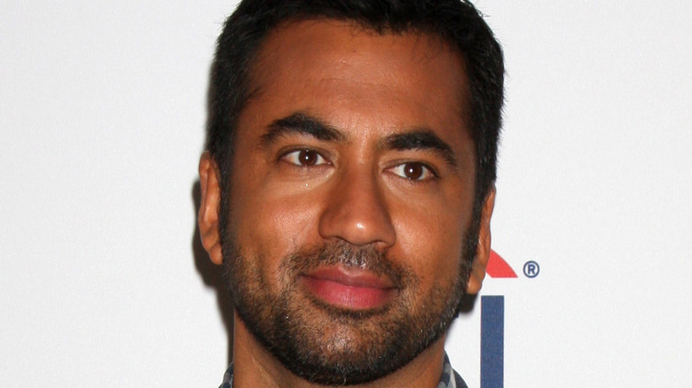 Kal Penn looking away