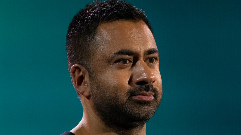 Kal Penn looking away