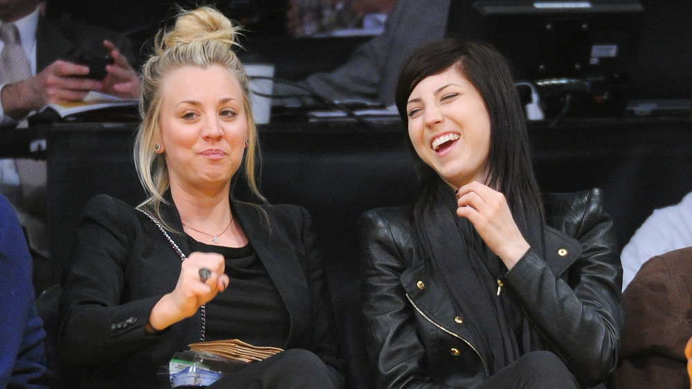 Kaley Cuoco and Briana Cuoco at a basketball game