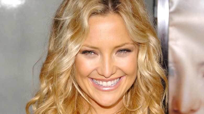 Kate Hudson smiles during an event