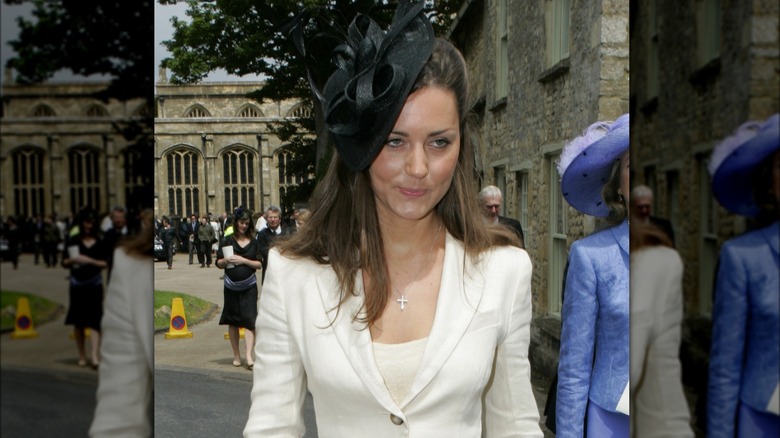 Kate Middleton white suit pouting