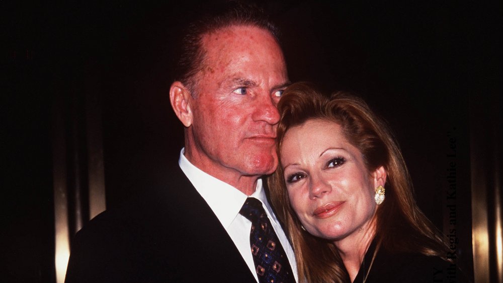 Frank Gifford and Kathie Lee Gifford hugging at a party for Live with Regis and Kathie Lee 