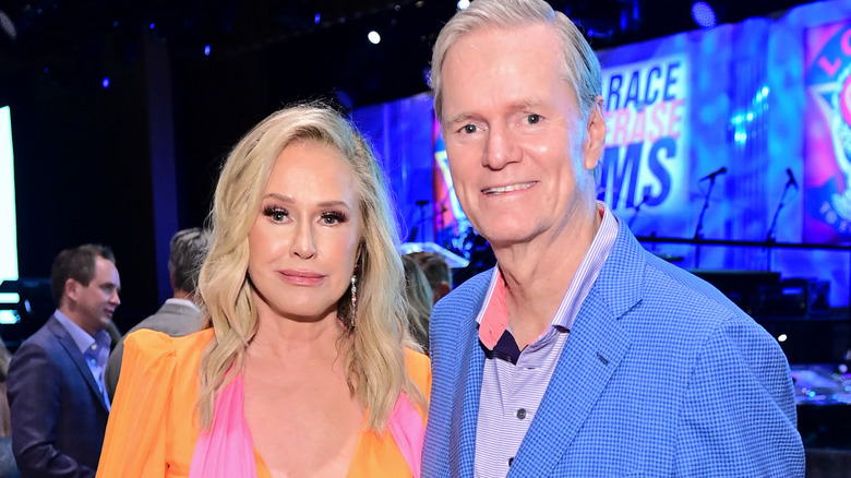 Kathy and Richard Hilton at an event, posing