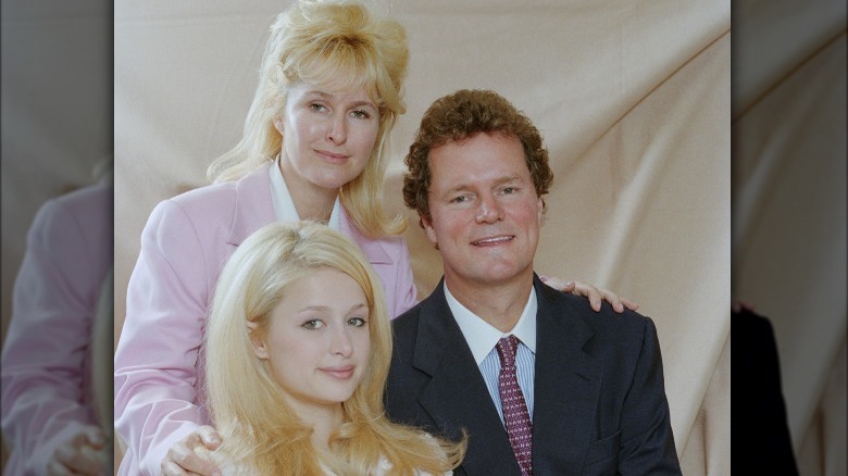 Kathy, Richard, and Paris Hilton at an event 