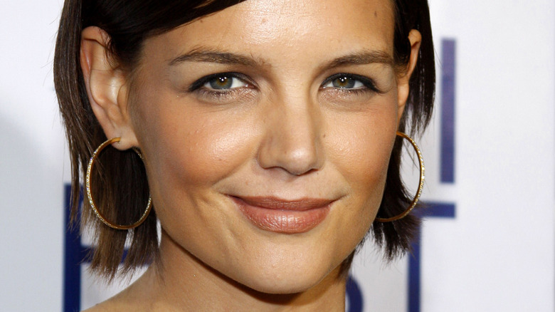 Katie Holmes with short hair, smiling