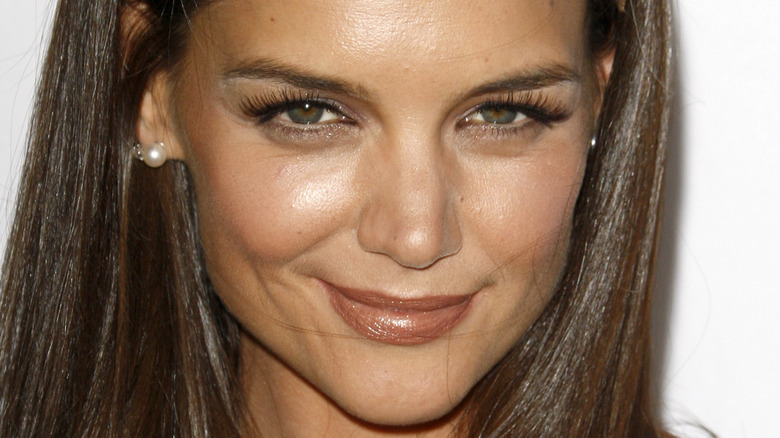 Katie Holmes gives a devilish look