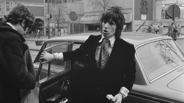 Keith Richards getting out of car