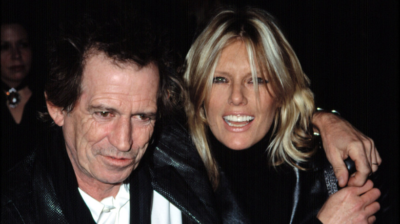 Keith Richards and Patti Hansen, arm in arm