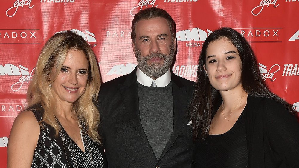 Kelly Preston, John Travolta, and daughter Ella Bleu Travolta attend the Ambi Gala In Honor of the Movie "Trading Paint"