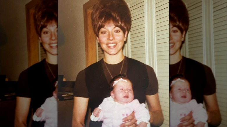 Baby Kelly Ripa playing with her mom