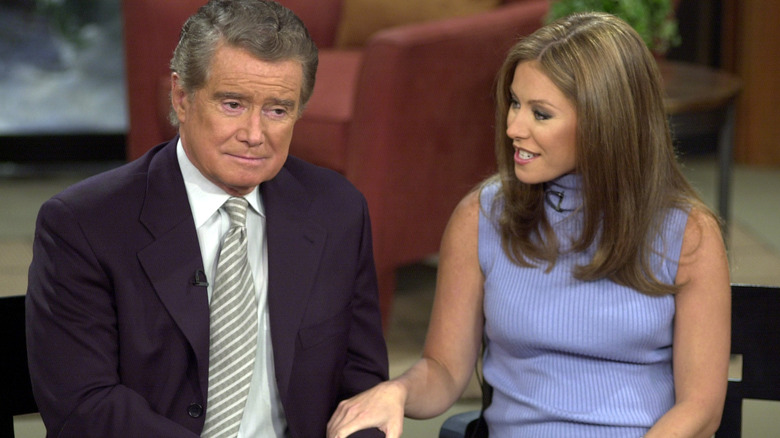 Kelly Ripa speaking with Regis Philbin