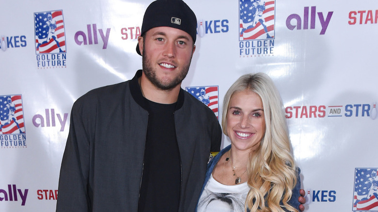 Matthew and Kelly Stafford on a red carpet