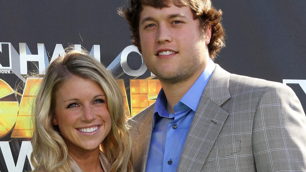 Kelly Stafford and Matthew Stafford on a red carpet 