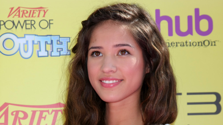 Kelsey Asbille smiling at event 