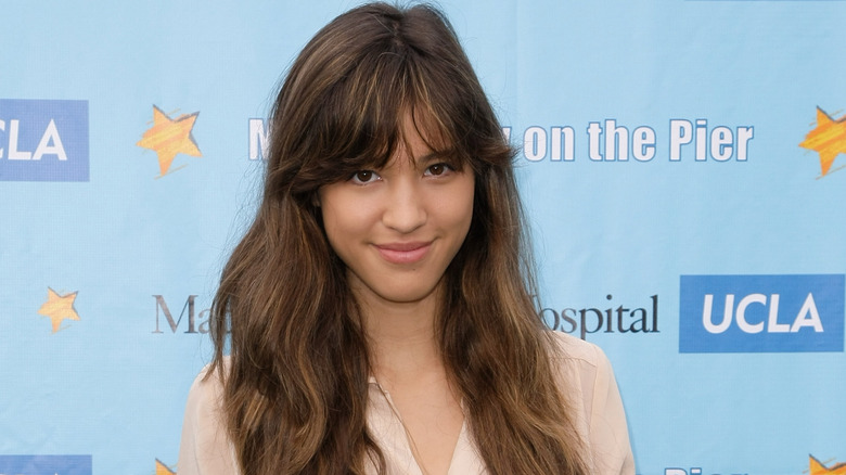 Kelsey Asbille posing at event