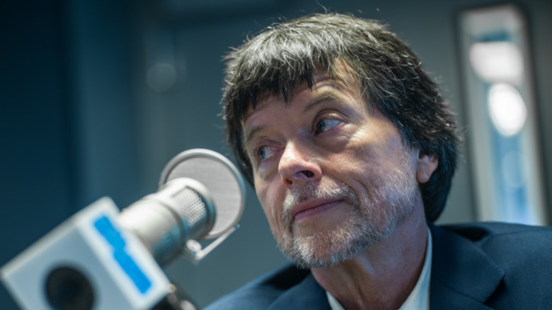 Ken Burns in front of a mic