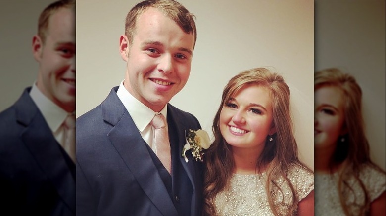 Joe and Kendra Duggar smiling on their wedding day