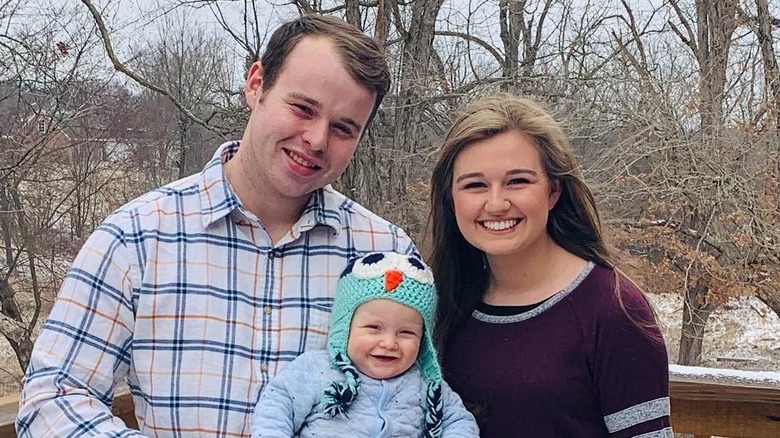 Joe, Kendra, Garrett Duggar posing in the snow