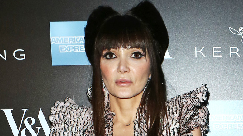 Annabelle Neilson wearing a necklace