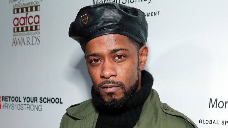 LaKeith Stanfield wearing a black hat