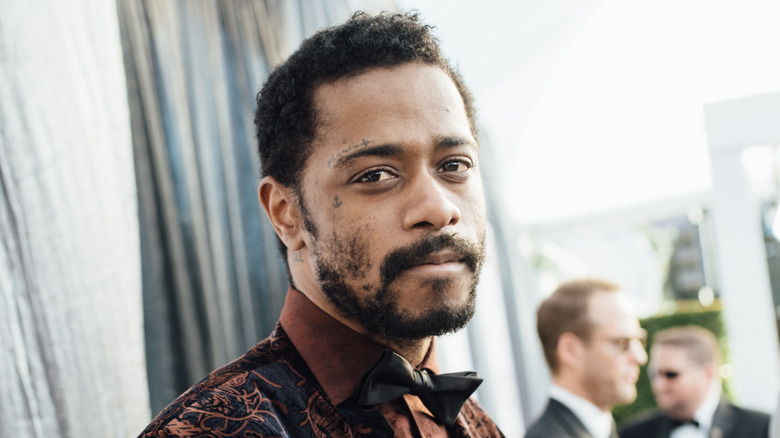 LaKeith Stanfield posing on a red carpet