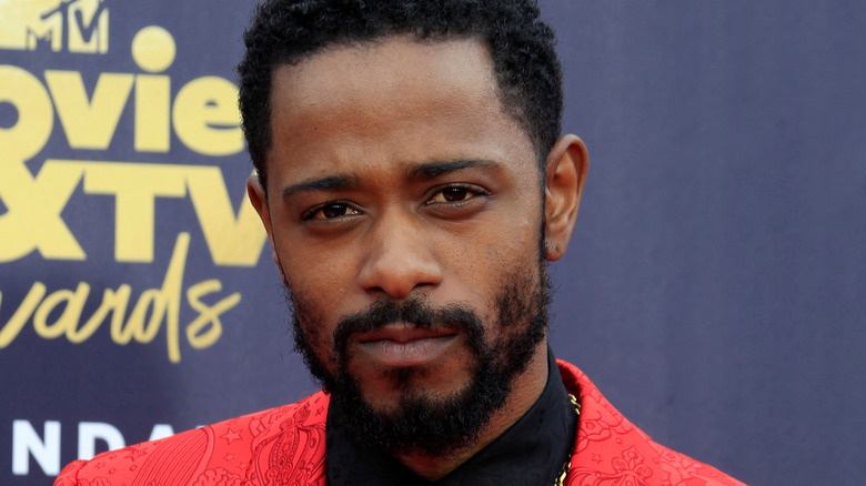 LaKeith Stanfield posing on a red carpet