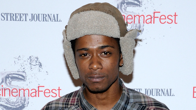 LaKeith Stanfield in a furry hat