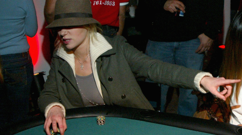 Laura Prepon playing poker