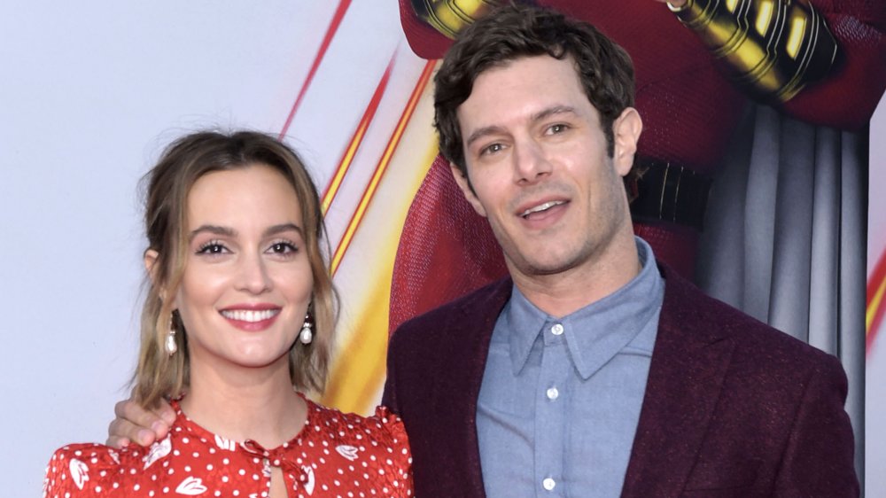 Leighton Meester and Adam Brody attend the world premiere of "Shazam!"