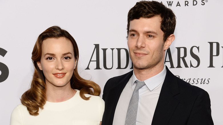 Leighton Meester and Adam Brody smiling