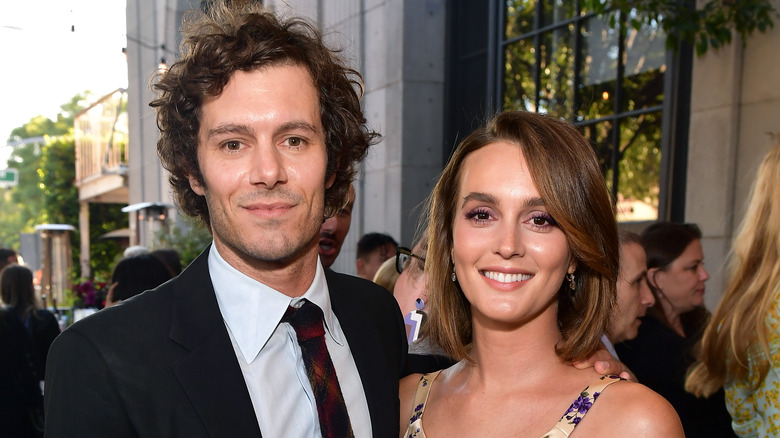 Adam Brody and Leighton Meester smiling