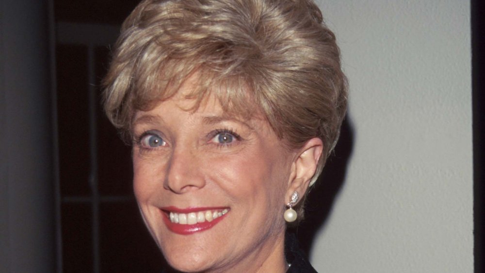 Young Lesley Stahl with short hair and red lipstick