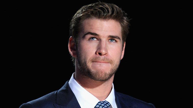 Liam Hemsworth gazing up