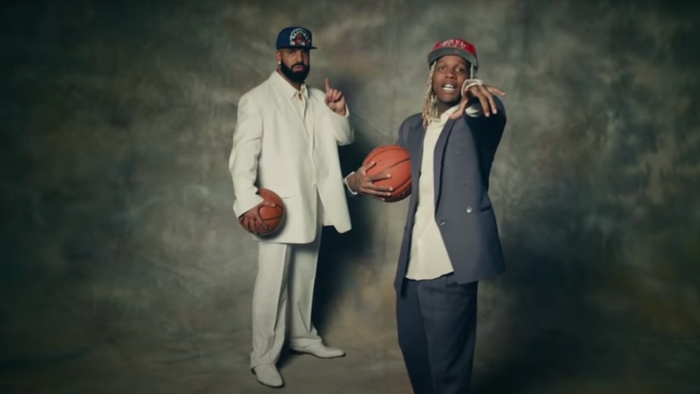 Drake and Lil Durk both holding basketballs