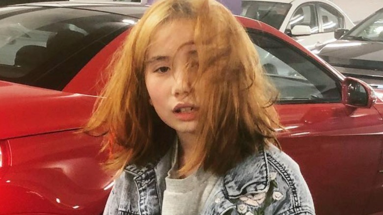 Lil Tay with red hair