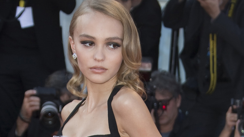 Lily-Rose Depp looking over shoulder, posing