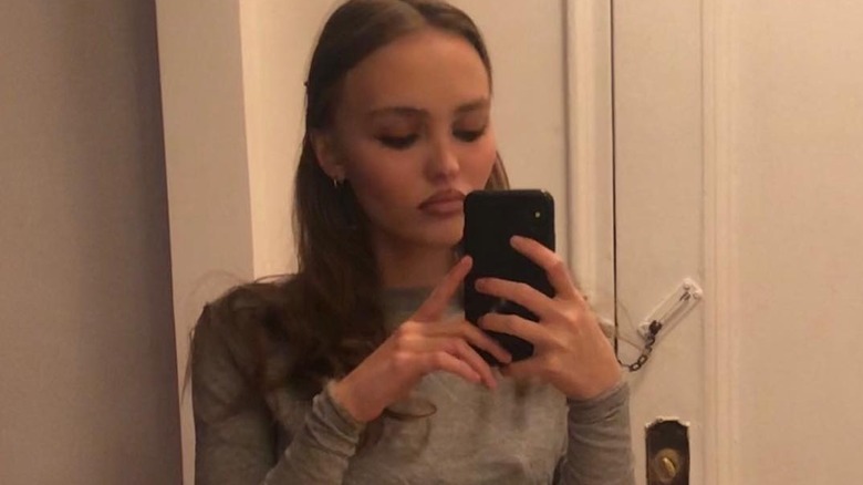 Lily-Rose Depp with camera, taking selfie