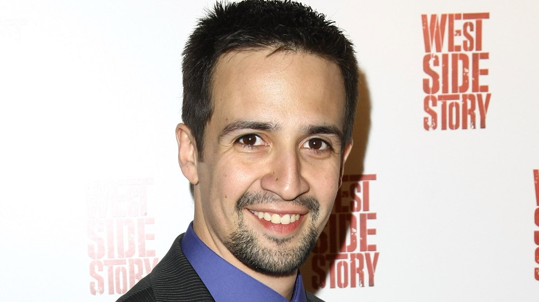 Lin-Manuel Miranda wearing a dark suit