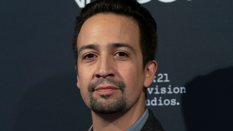 Lin-Manuel Miranda with a stoic look