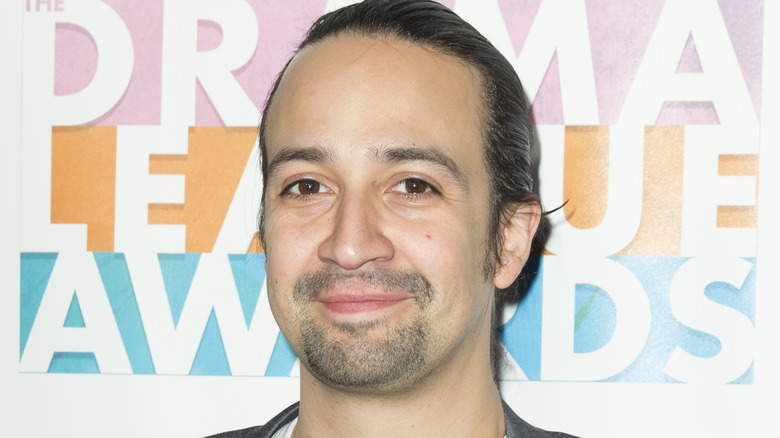 Lin-Manuel Miranda with his hair pulled back