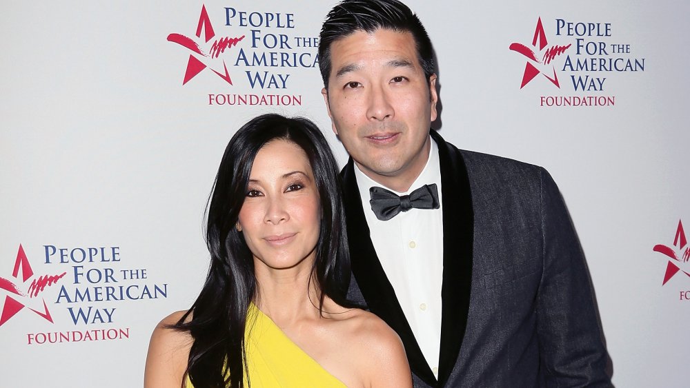 Lisa Ling posing with Paul Song on red carpet 