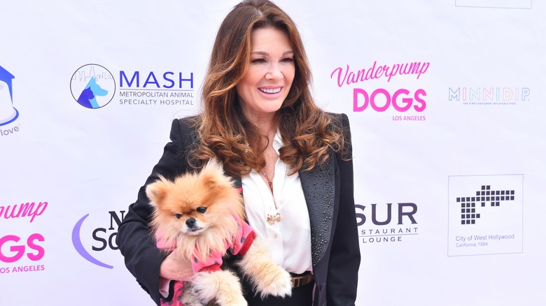 Lisa Vanderpump posing with a dog