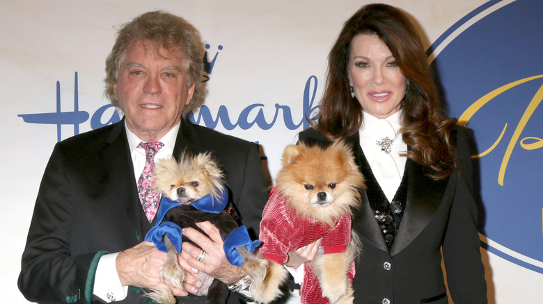 Ken Todd and Lisa Vanderpump posing with dogs