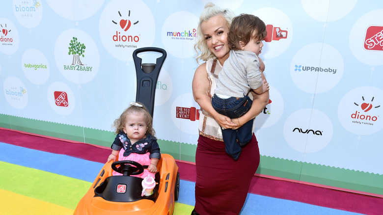 Terra Jolé posing with her children