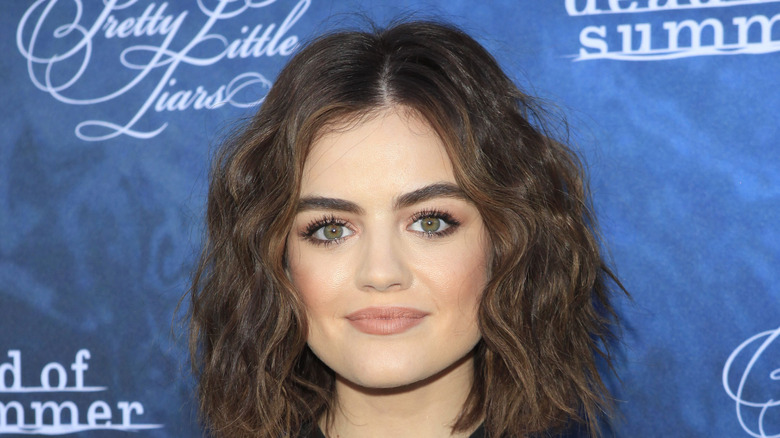 Lucy Hale posing at an event