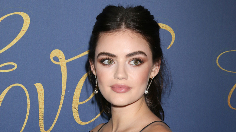 Lucy Hale posing at an event